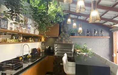 Imagem: A casa possui 2 Dormitórios, 3 Banheiros, 1 Vaga na garagem