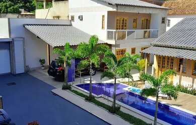 Imagem: A casa possui 3 Dormitórios, 3 Banheiros, 1 Vaga na garagem