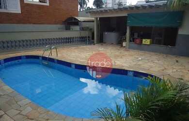 Imagem: A casa possui 3 Dormitórios, 5 Banheiros, 2 Vagas na garagem