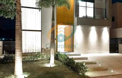 Imagem: A casa possui 4 Dormitórios, 5 Banheiros, 3 Vagas na garagem