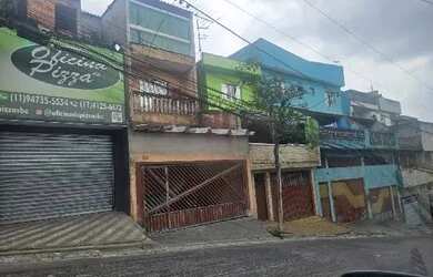 Imagem: A casa possui 4 Dormitórios, 2 Banheiros, 2 Vagas na garagem