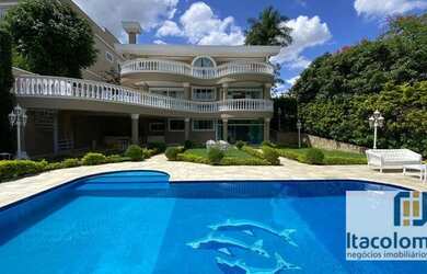 Imagem: A casa em condomínio possui 4 Dormitórios, 5 Banheiros, 2