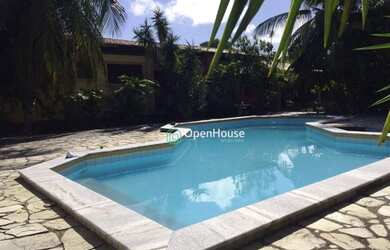 Imagem: A casa possui 3 Dormitórios, 5 Banheiros, 5 Vagas na garagem