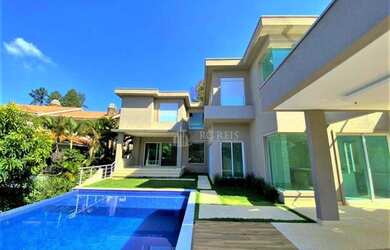 Imagem: A casa em condomínio possui 5 Dormitórios, 5 Banheiros, 5