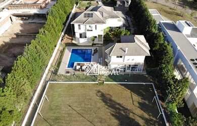 Imagem: A casa em condomínio possui 5 Dormitórios, 5 Banheiros, 5