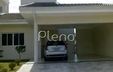 Imagem: A casa possui 3 Dormitórios, 2 Banheiros, 4 Vagas na garagem