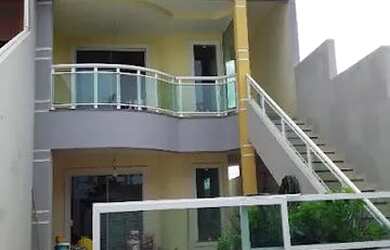 Imagem: A casa possui 3 Dormitórios, 3 Banheiros, 1 Vaga na garagem