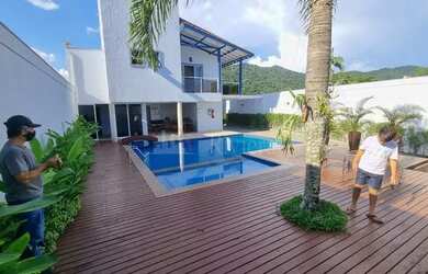 Imagem: A casa em condomínio possui 3 Dormitórios, 4 Banheiros, 2