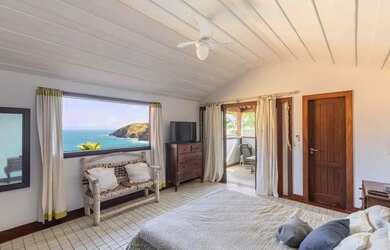 Imagem: A casa possui 5 Dormitórios, 5 Banheiros, 5 Vagas na garagem