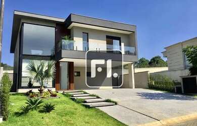 Imagem: A casa em condomínio possui 4 Dormitórios, 5 Banheiros, 5