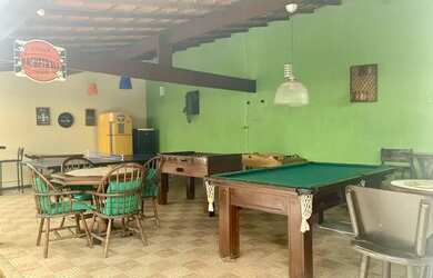 Imagem: A casa possui 3 Dormitórios, 2 Vagas na garagem e está localizado