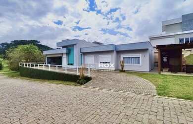 Imagem: A casa em condomínio possui 3 Dormitórios, 3 Banheiros, 2