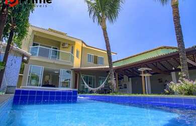 Imagem: A casa possui 4 Dormitórios, 4 Banheiros, 4 Vagas na garagem