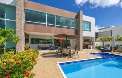 Imagem: A casa em condomínio possui 4 Dormitórios, 5 Banheiros, 2