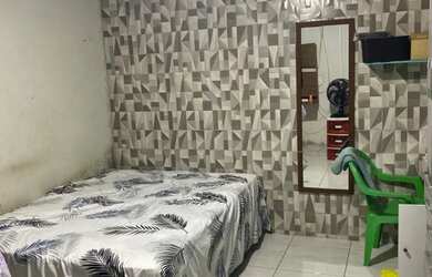 Imagem: A casa possui 2 Dormitórios, 1 Banheiro, 1 Vaga na garagem