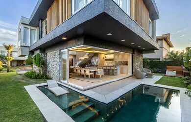 Imagem: A casa em condomínio possui 5 Dormitórios, 5 Banheiros, 2