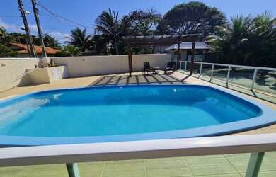 Imagem: A casa possui 5 Dormitórios, 5 Banheiros, 5 Vagas na garagem