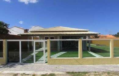 Imagem: A casa possui 3 Dormitórios, 4 Banheiros, 2 Vagas na garagem