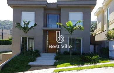 Imagem: A casa em condomínio possui 5 Dormitórios, 5 Banheiros, 4