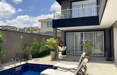 Imagem: A casa em condomínio possui 4 Dormitórios, 5 Banheiros, 5