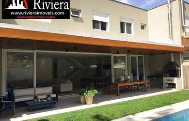 Imagem: A casa em condomínio possui 5 Dormitórios, 5 Banheiros, 3