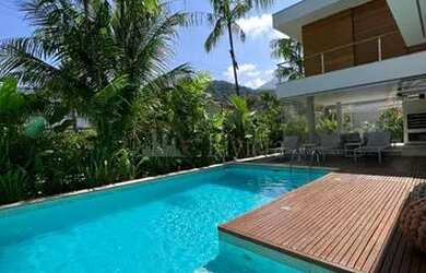 Imagem: A casa em condomínio possui 5 Dormitórios, 5 Banheiros, 2