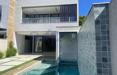 Imagem: A casa em condomínio possui 4 Dormitórios, 5 Banheiros e 360m²