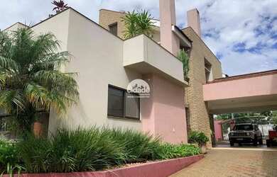 Imagem: A casa possui 3 Dormitórios, 2 Banheiros, 5 Vagas na garagem