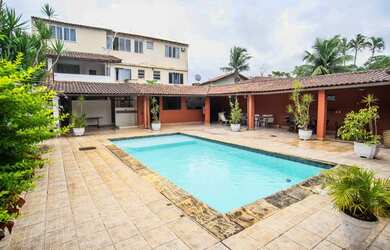 Imagem: A casa possui 5 Dormitórios, 5 Banheiros, 5 Vagas na garagem