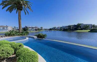 Imagem 12: Mansão beira lago com 8 suítes e piscina à venda, 953 m² - Condomínio...