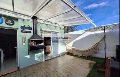 Imagem: A casa em condomínio possui 3 Dormitórios, 2 Banheiros, 1