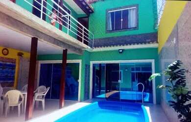 Imagem: A casa possui 3 Dormitórios, 3 Banheiros, 3 Vagas na garagem