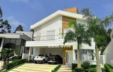 Imagem: A casa em condomínio possui 5 Dormitórios, 5 Banheiros, 5