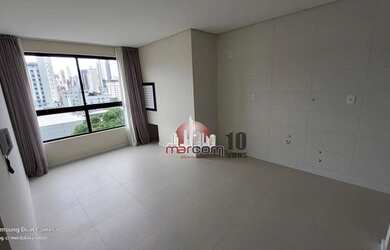 Imagem: O apartamento possui 2 Dormitórios, 1 Banheiro, 2 Vagas na