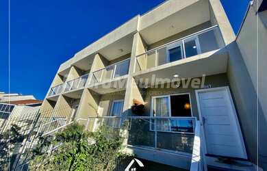 Imagem: A casa possui 2 Dormitórios, 3 Banheiros, 3 Vagas na garagem