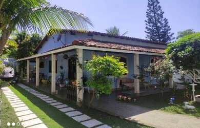 Imagem: A casa possui 3 Dormitórios, 1 Banheiro, 5 Vagas na garagem
