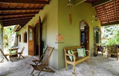 Imagem: A casa possui 3 Dormitórios, 3 Banheiros, 3 Vagas na garagem