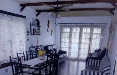 Imagem: A casa possui 3 Dormitórios, 3 Vagas na garagem e está localizado