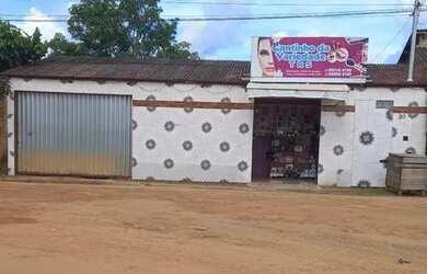 Imagem: A casa possui 2 Dormitórios, 2 Banheiros, 2 Vagas na garagem