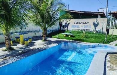 Imagem: A casa possui 3 Dormitórios, 5 Vagas na garagem e está localizado