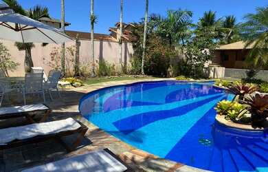 Imagem: A casa em condomínio possui 5 Dormitórios, 5 Banheiros, 5