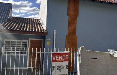 Imagem: A casa possui 3 Dormitórios, 2 Banheiros, 2 Vagas na garagem