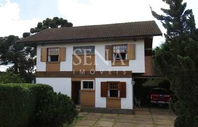 Imagem: A casa possui 3 Dormitórios, 3 Banheiros, 5 Vagas na garagem