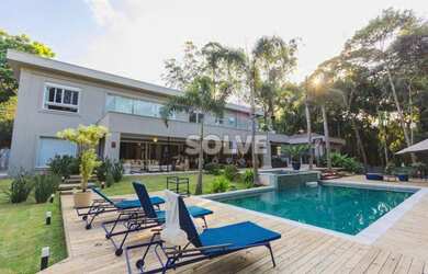 Imagem: A casa em condomínio possui 4 Dormitórios, 5 Banheiros, 5