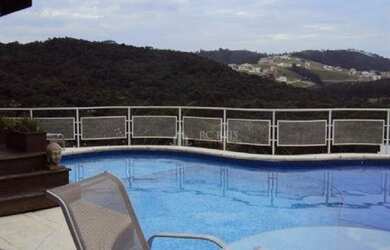 Imagem: A casa em condomínio possui 4 Dormitórios, 5 Banheiros, 5