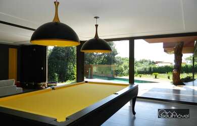 Imagem: A casa em condomínio possui 5 Dormitórios, 5 Banheiros, 4