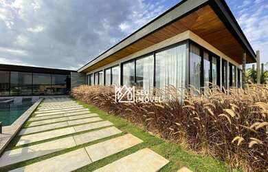 Imagem: A casa em condomínio possui 5 Dormitórios, 5 Banheiros, 5