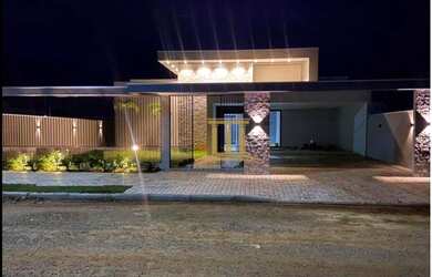 Imagem: A casa possui 3 Dormitórios, 4 Banheiros, 2 Vagas na garagem