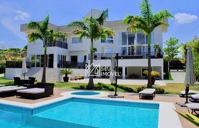 Imagem: A casa em condomínio possui 5 Dormitórios, 5 Banheiros, 5