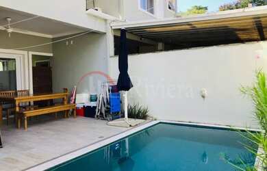 Imagem: A casa em condomínio possui 4 Dormitórios, 5 Banheiros, 2